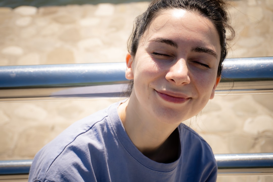 person looking relieved and empowered - defend my debt