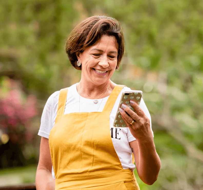 Senior woman watching video on smart phone