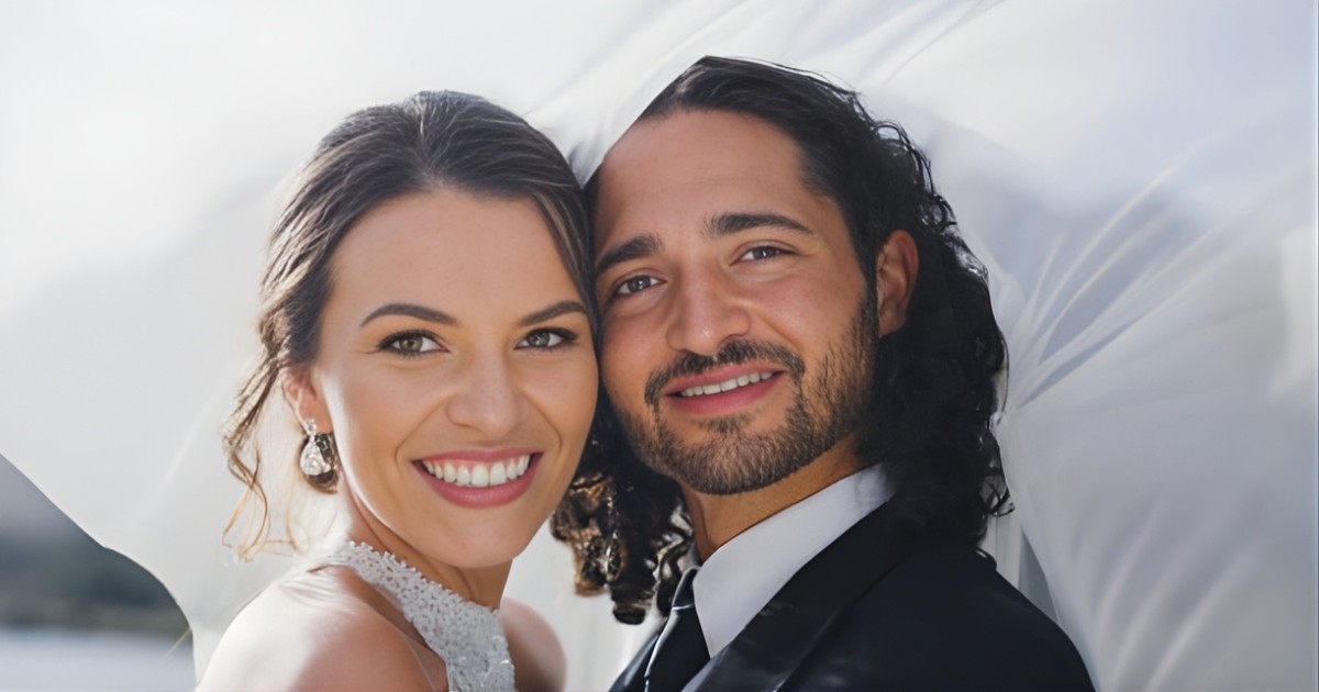 Bride and groom smiling with a bright, natural wedding smile after dental treatment