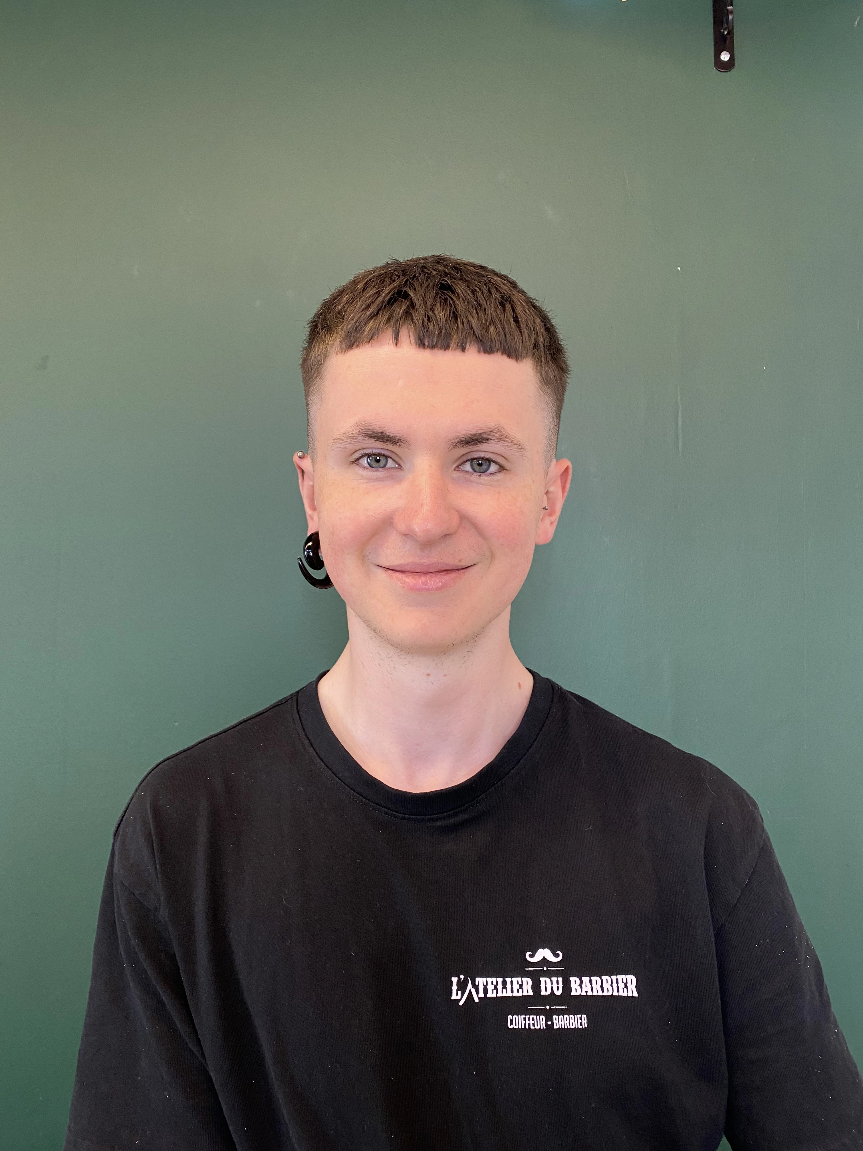 man wearing white V-neck shirt