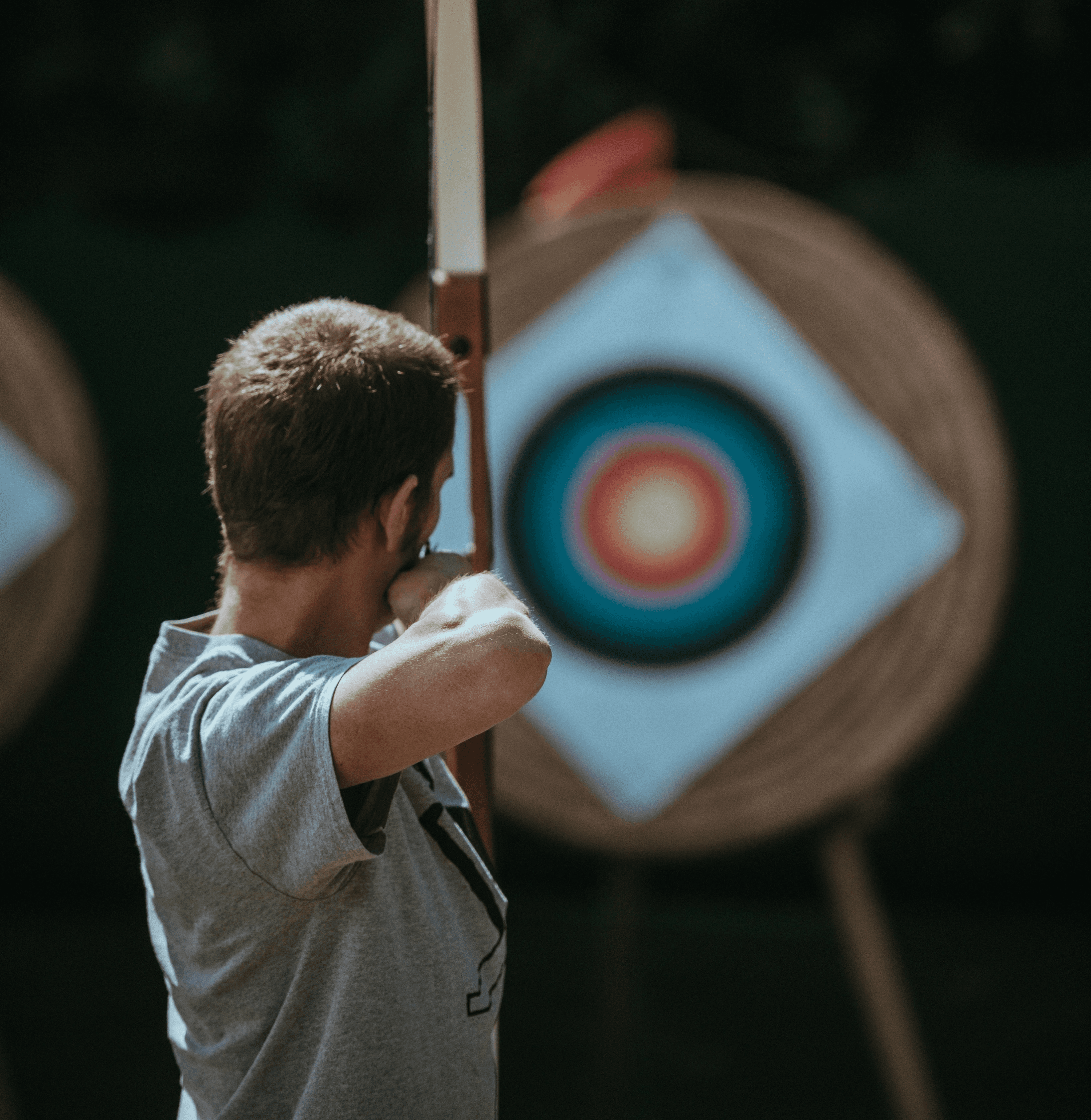 white and brown composite bow