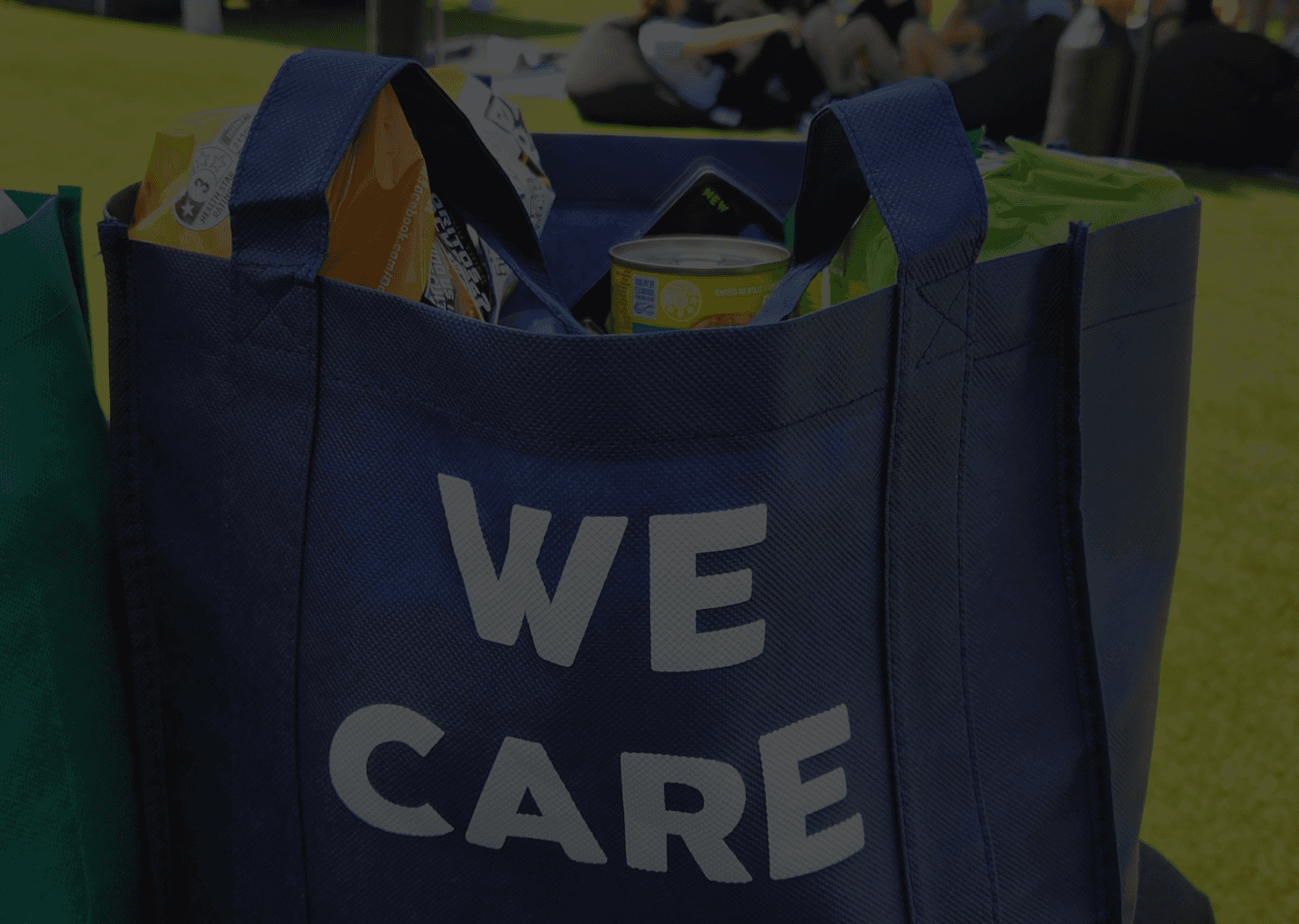 a blue tote bag sitting on top of a table