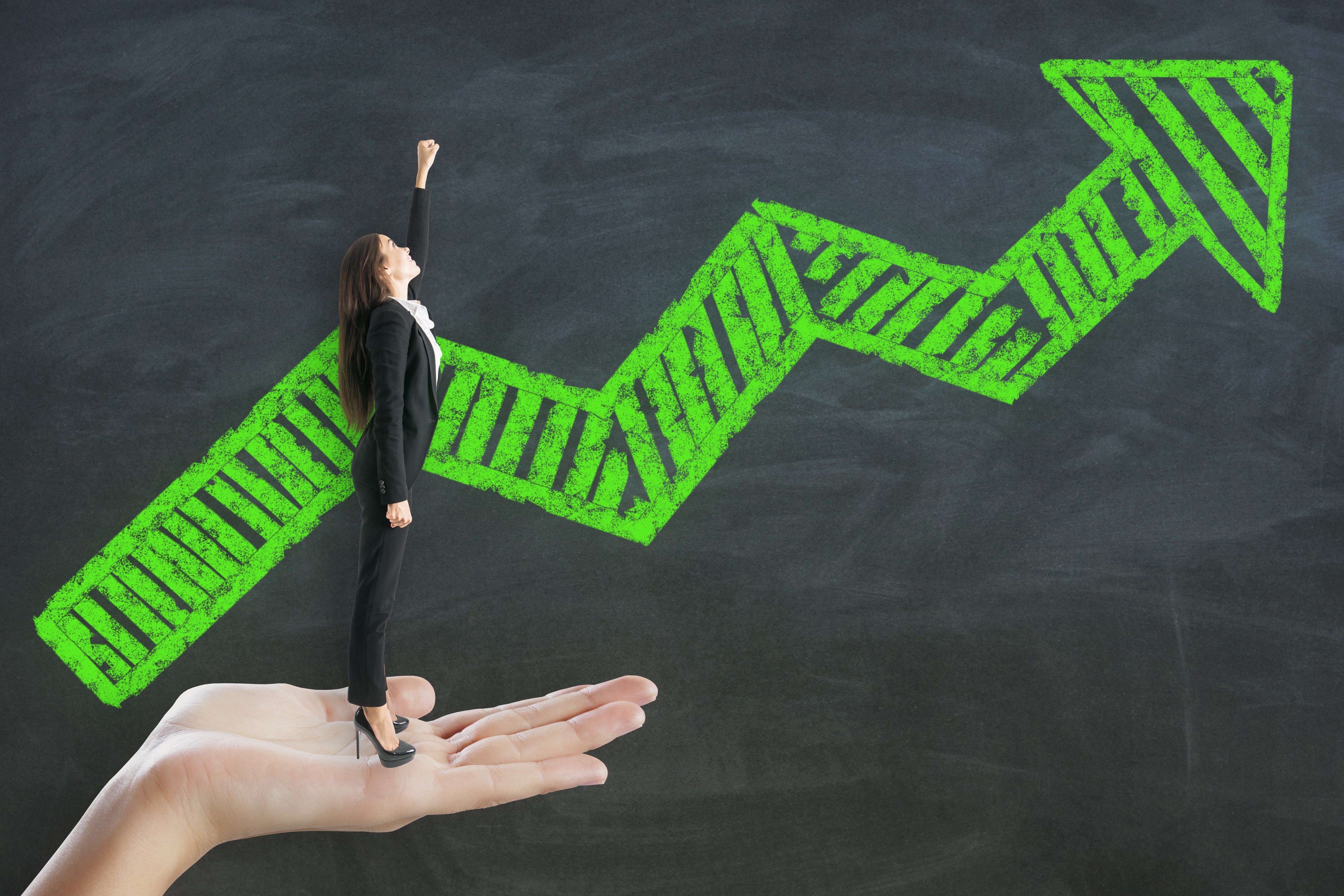 SIGNAL Method sales success: businesswoman celebrating sales growth with upward chalkboard arrow