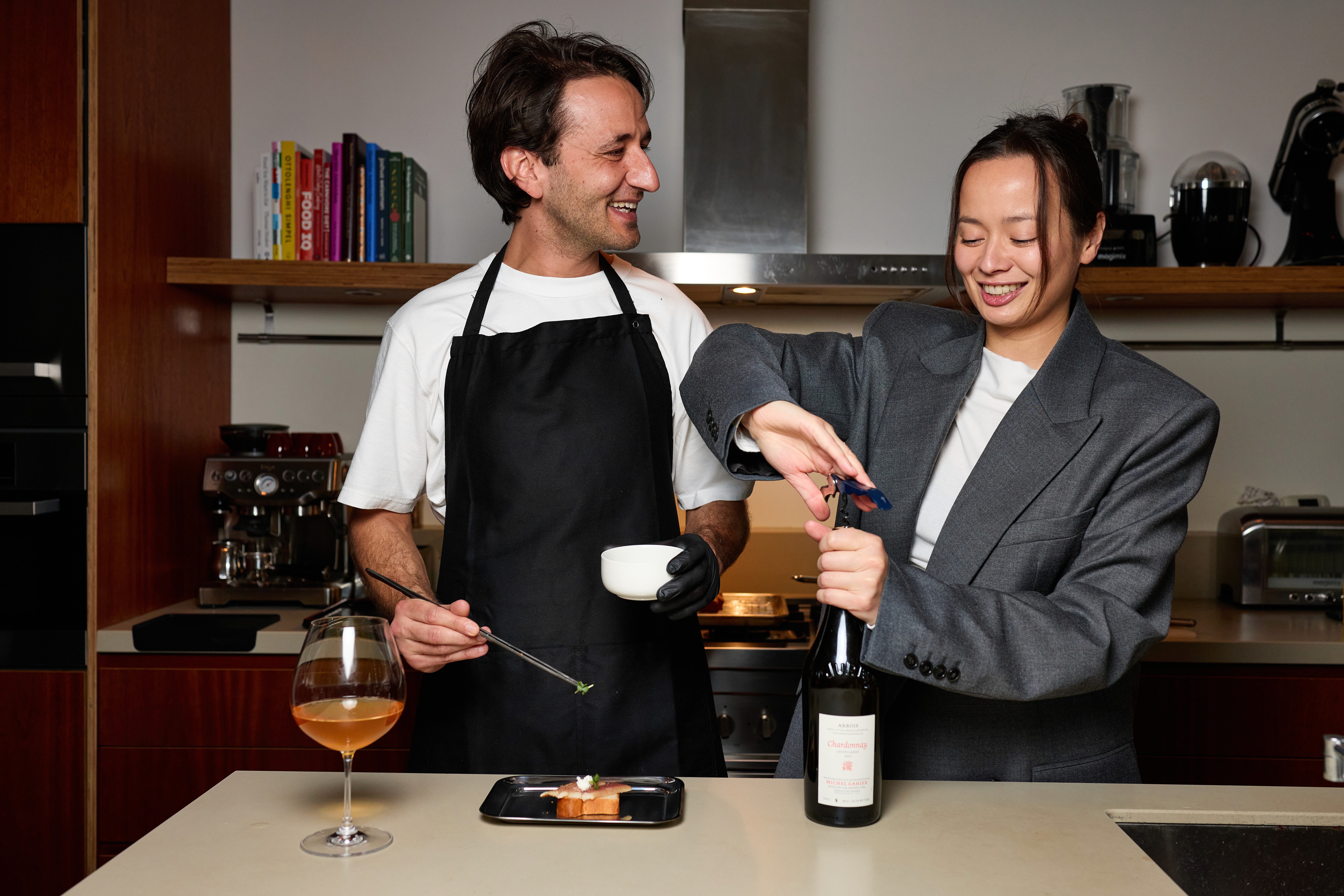 a white plate topped with fish and veggies