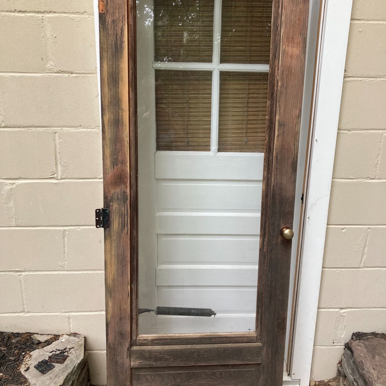 Refinished antique wood-and-glass interior door with multi-pane window