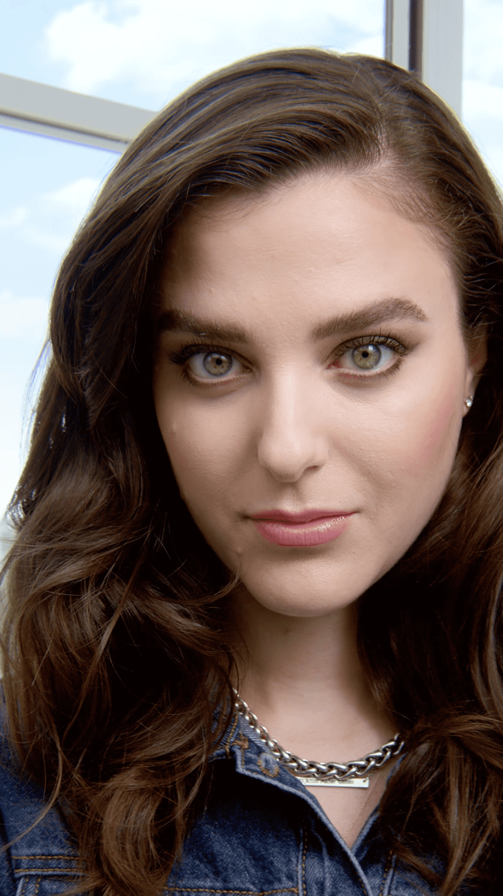 Woman models her finish eye look