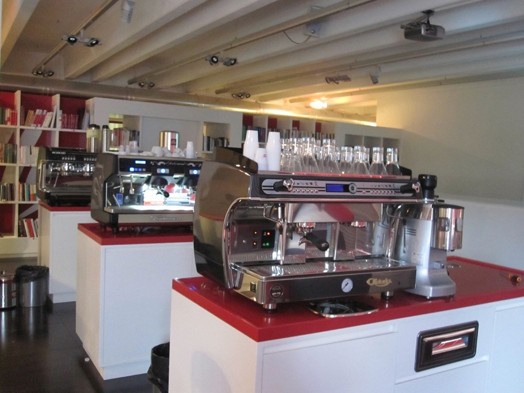 A photo of drink dispensers and coffee mixers.