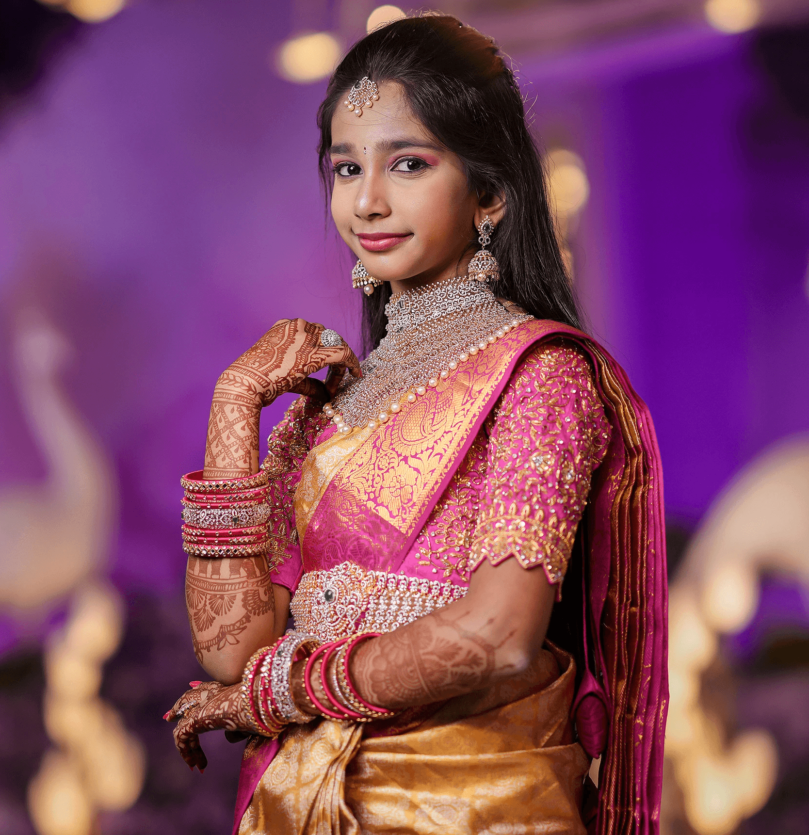Mountain refuge illuminated at night under starry sky.