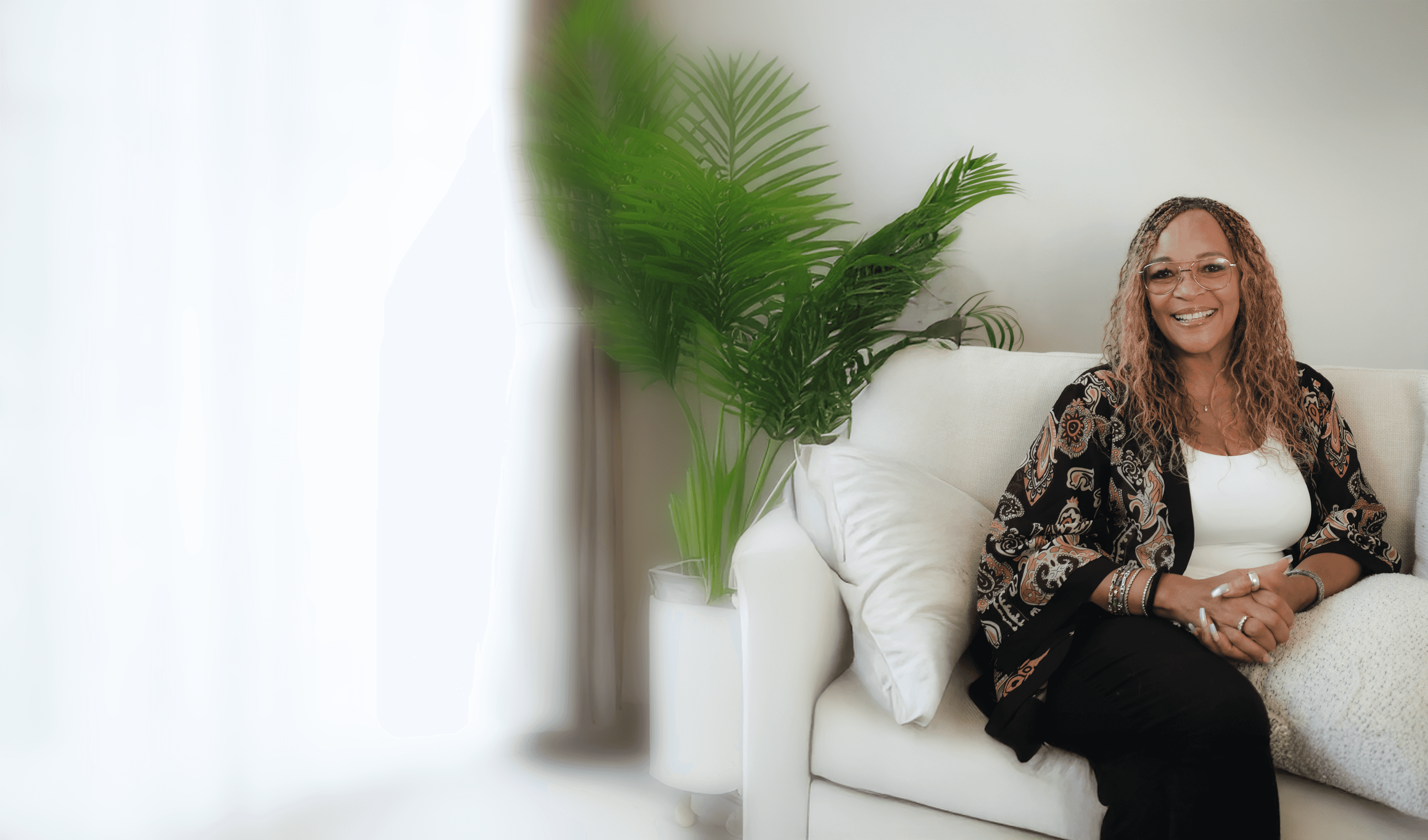 white and green boat on water near white concrete building during daytime