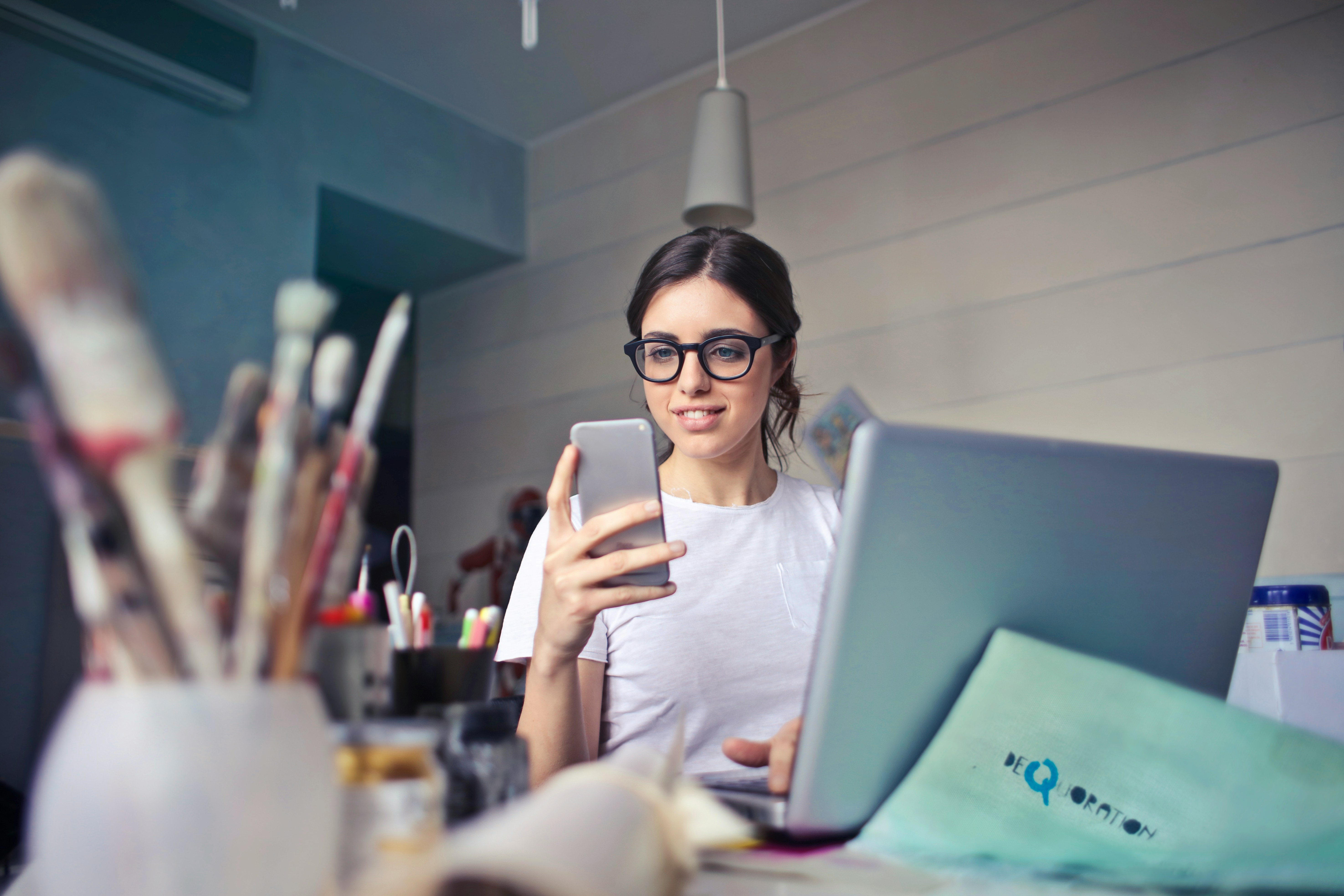 woman looking at apps - Options Trading Tools