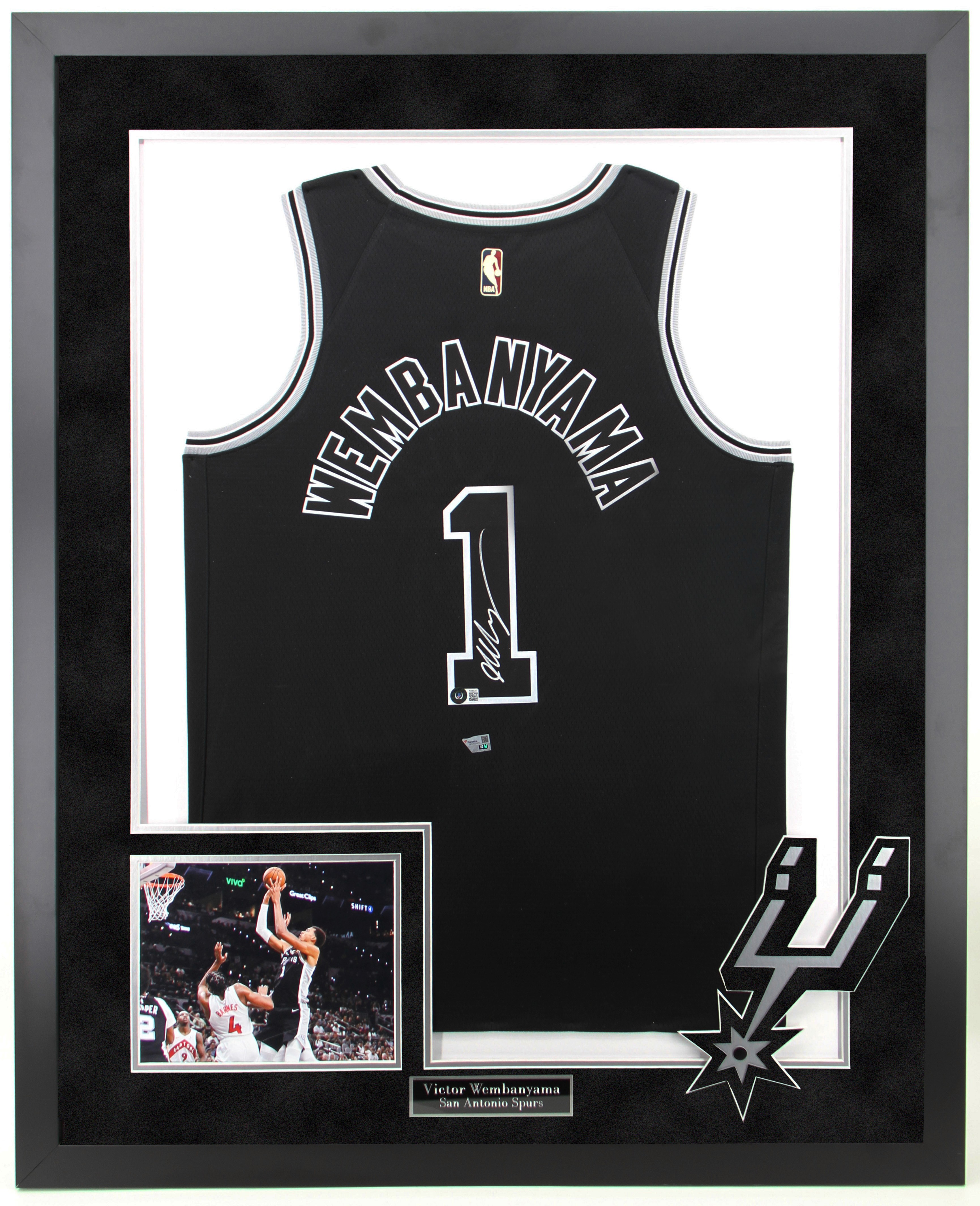 Modern bathroom featuring a walk-in shower, wooden vanity, round mirror, and elegant marble tiles.