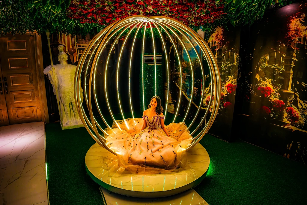 Debutante in a blush gown inside the golden sphere pavilion at Pandora Hall, Quezon City