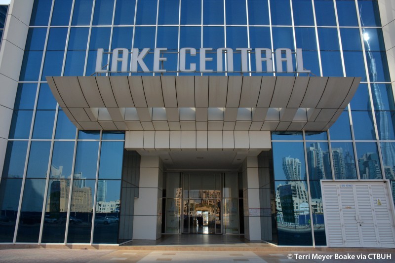 Close-up of the Lake Central entrance signage, representing a professional hub for real estate agents.