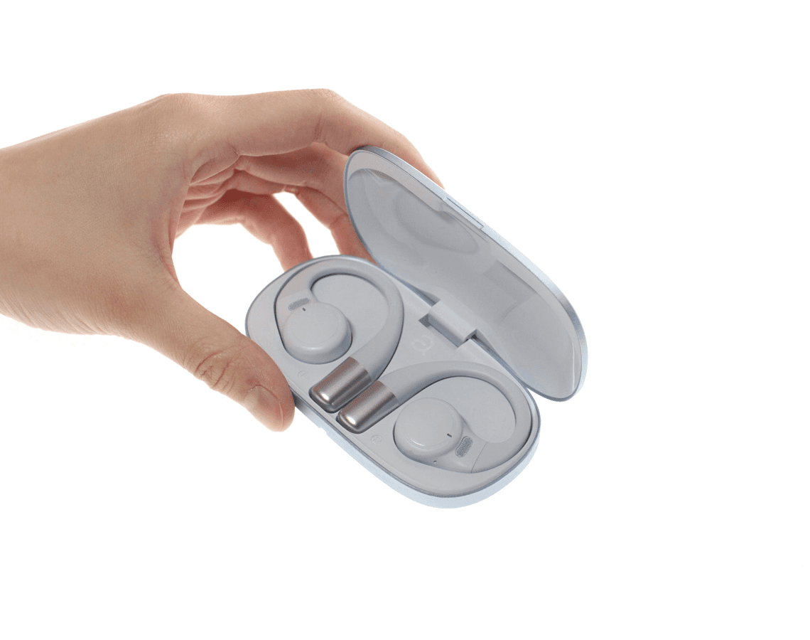 a white clock on a white surface