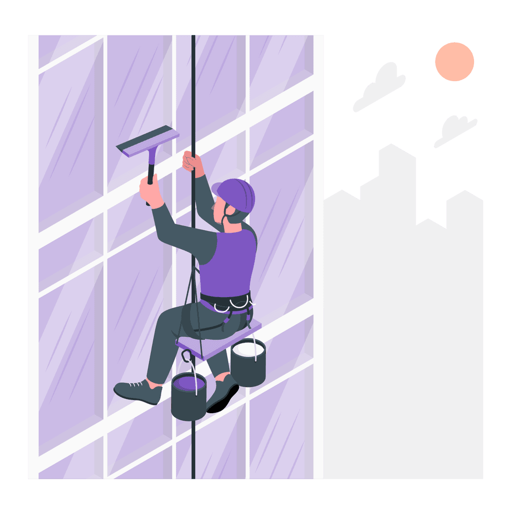 A window cleaner suspended outside a tall building, cleaning its large windows. 