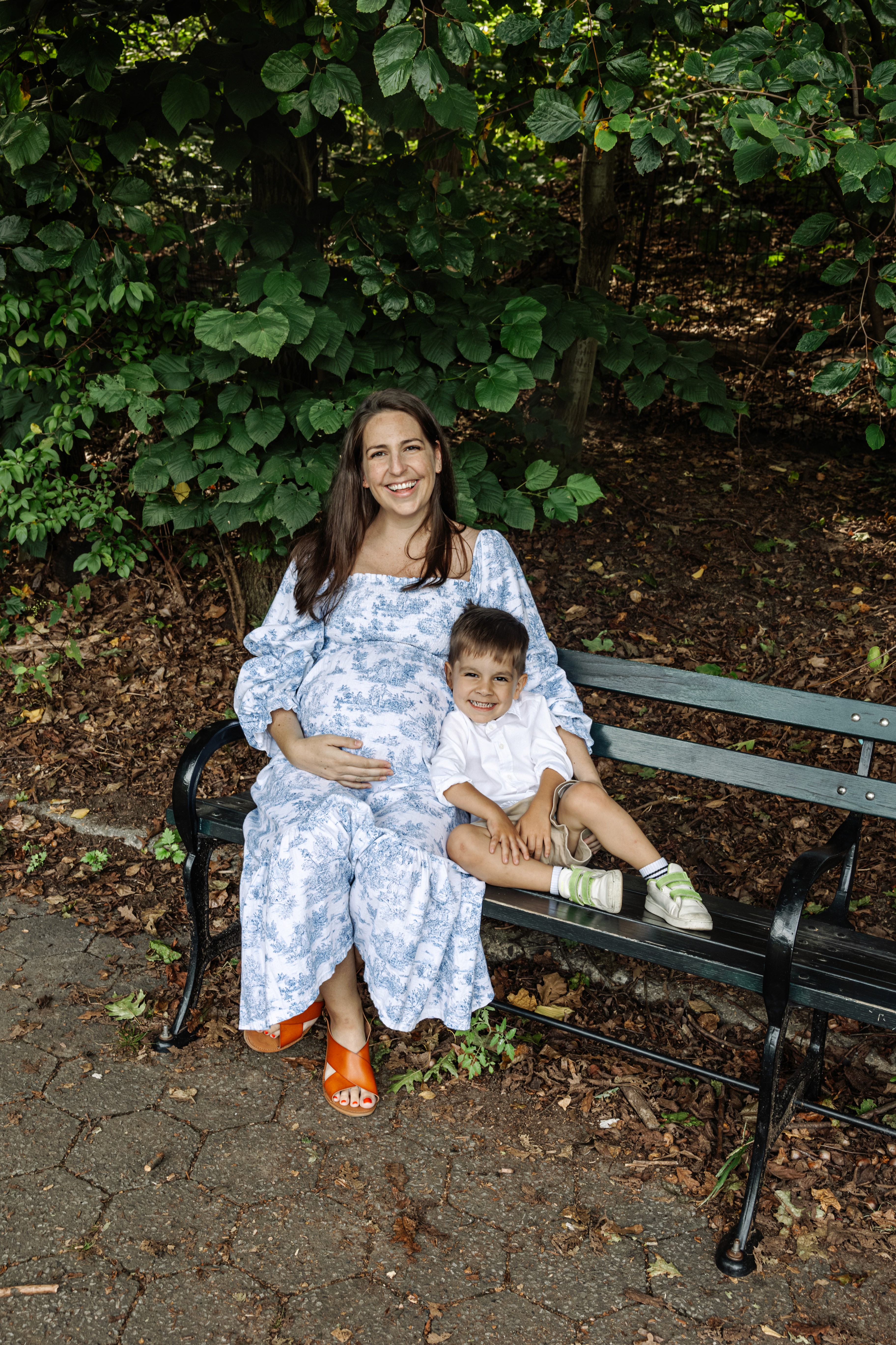 4:59 PMCouple caught in a genuine laugh on the stairs at Bethesda Fountain in Central Park, NYC — fun, unposed couples photography by Lizz Spano Photography, New York City couples photographer.