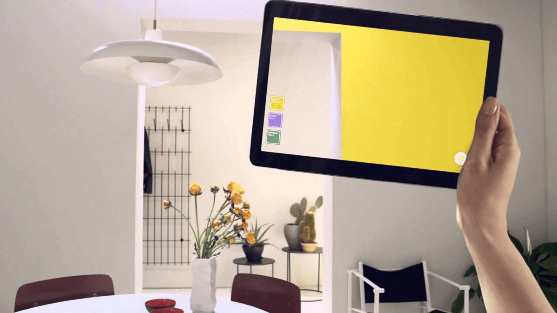 A shot of the Dulux app giving an augment view of what a room would look like with a different coloured wall