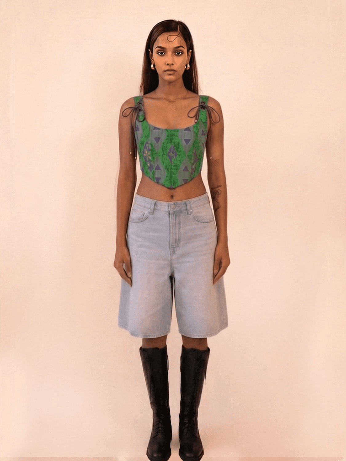 DHARA is our one-of-a-kind printed silk corset with delicate shoulder straps, handcrafted by skilled artisans in-house using a vintage silk saree.