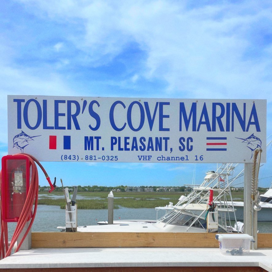Toler's Cove Marina dock sign — VHF Channel 16