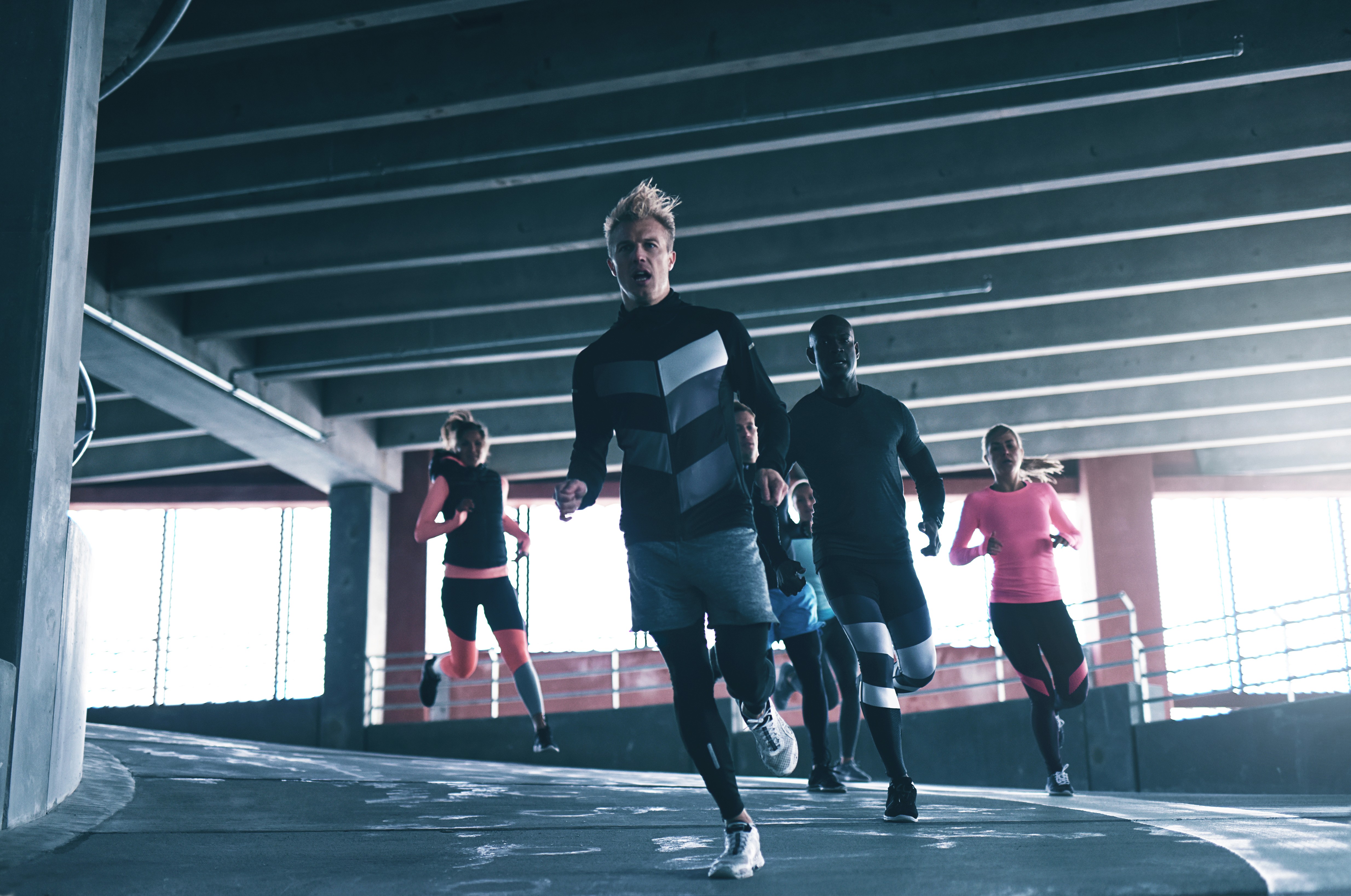 Close-up of a sleek smartphone with metallic edges, colorful app icons, and a textured finish, highlighting its premium design.