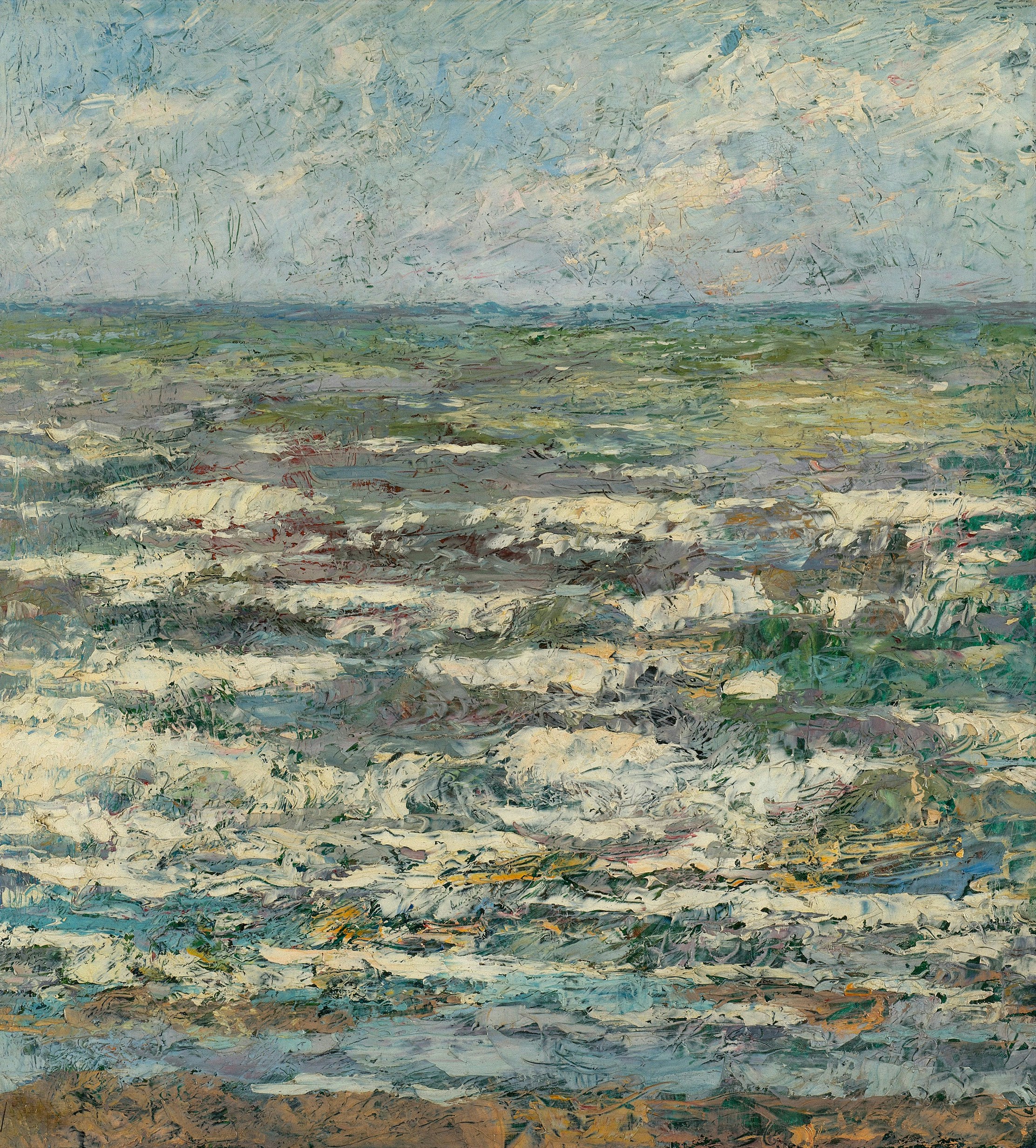 Rough ocean under a cloudy sky.