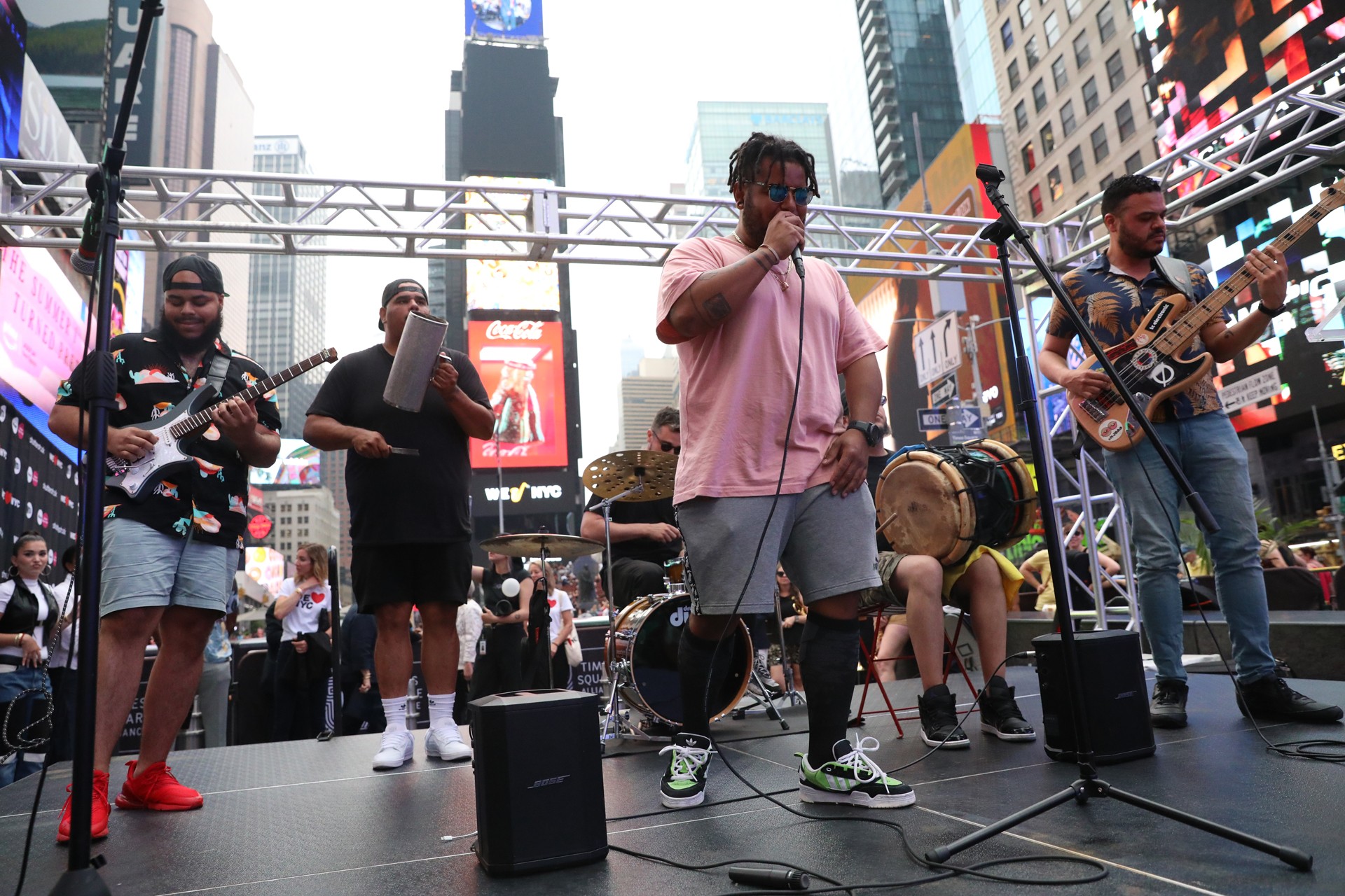 Band performs on a stage in Times Square