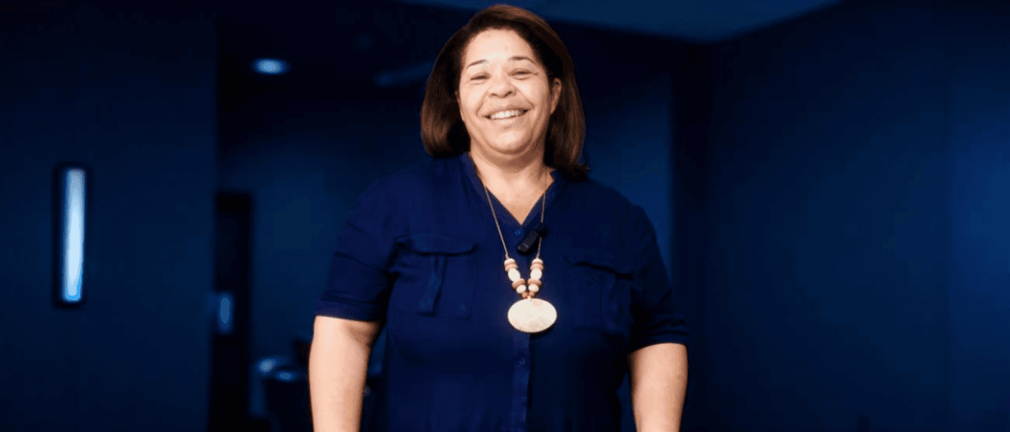 grayscale photo of woman wearing necklace and top