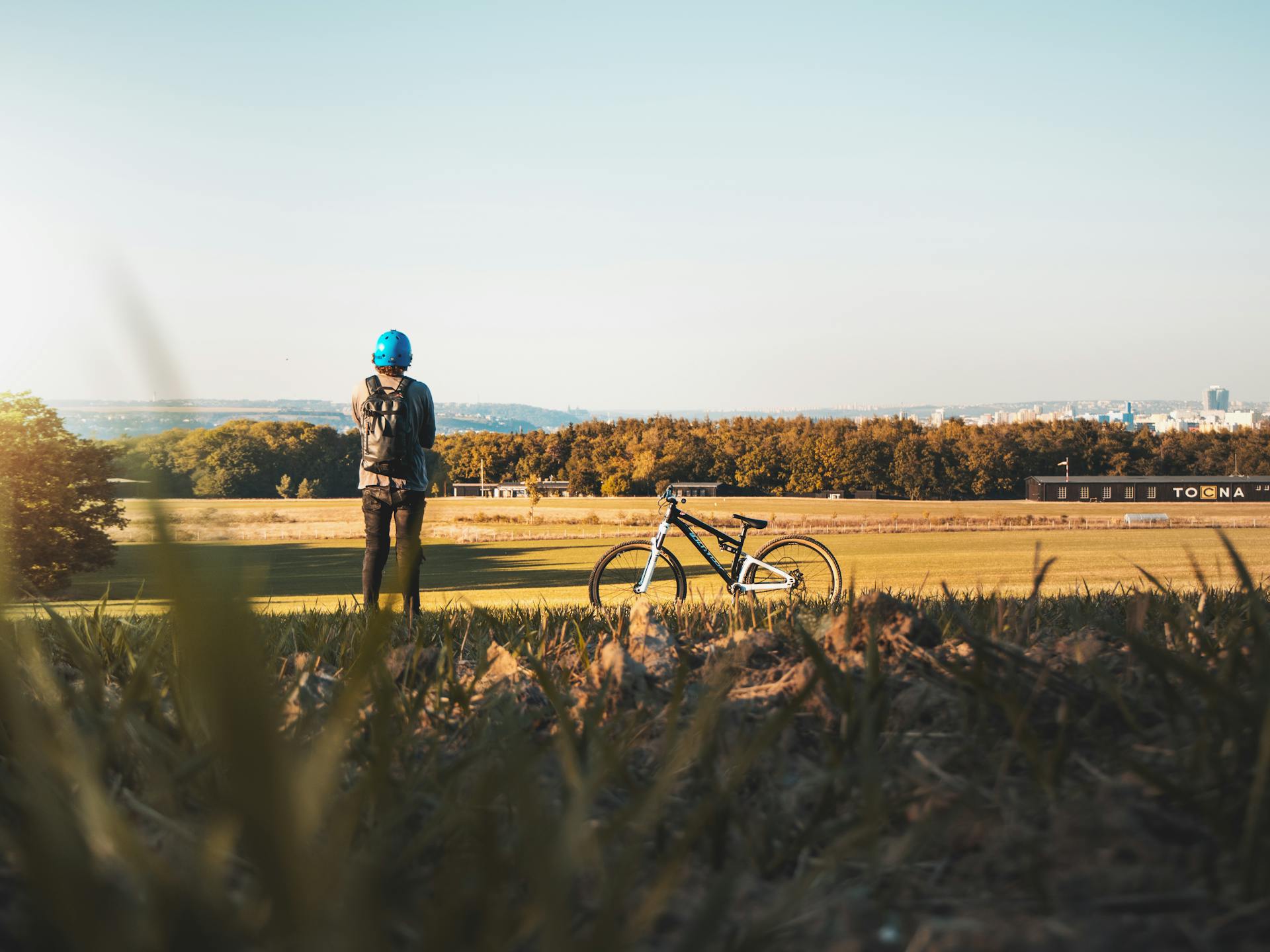 a group of people walking on a sidewalk