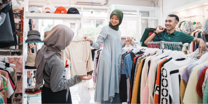 Customers shopping at a Malaysian clothing store