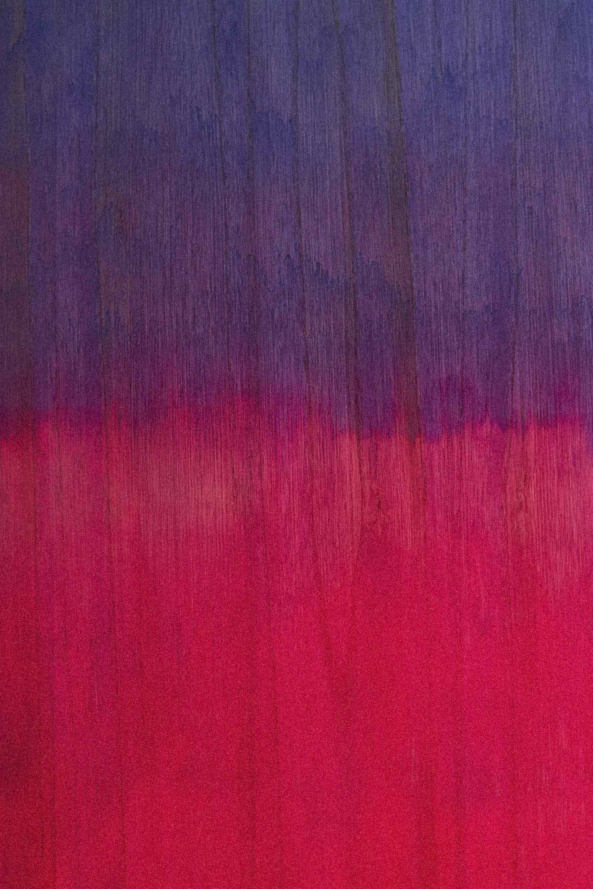 Purple and pink stain on a timber surfboard