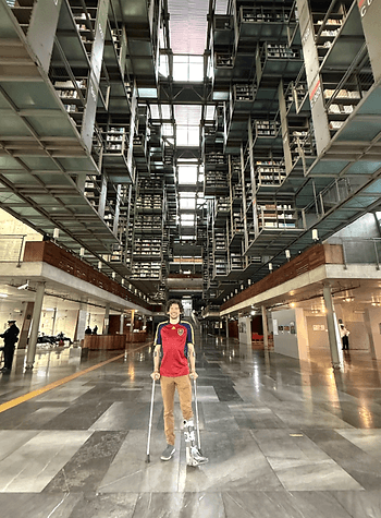 A man stands in the library called Biblioteca Vasconcelos in Mexico City.