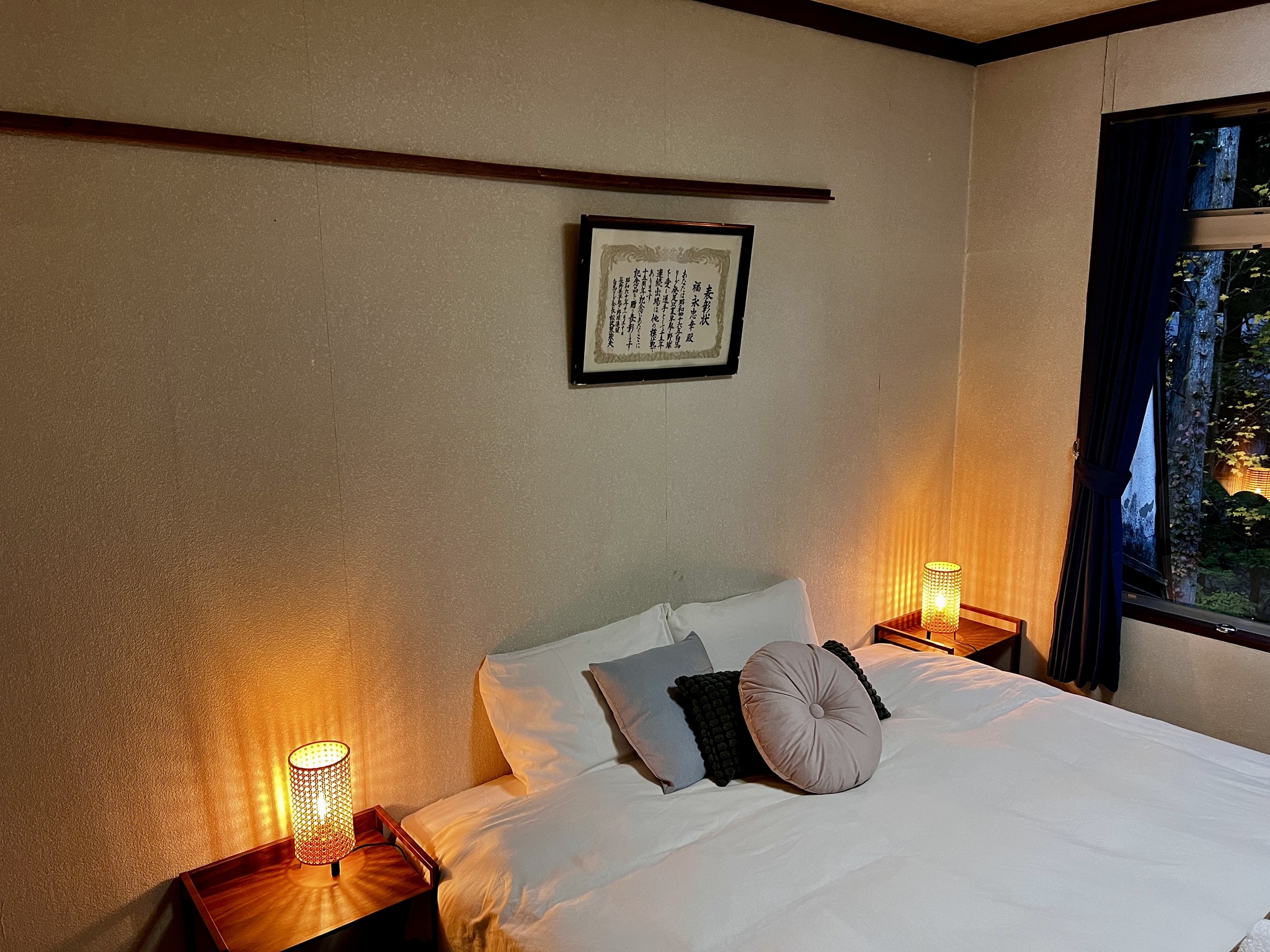 A cosy room with traditional Japanese design elements. The twin beds can be joined to create a spacious king bed. Ideal for couples or friends seeking a cultural experience.