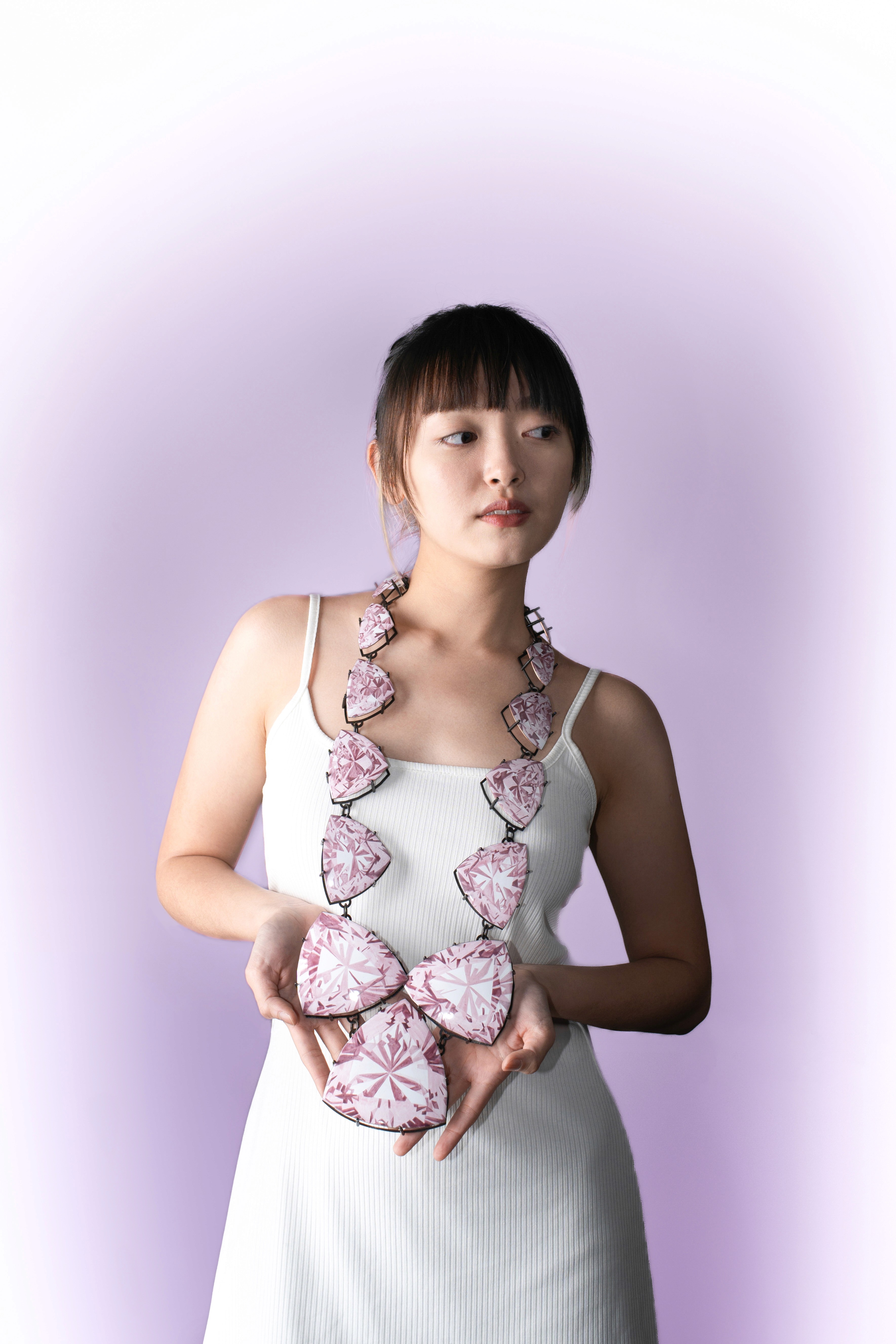 Gem by Yuxin Song worn by a model, painted enamel on copper, contemporary jewelry necklace, selected for SCHMUCK 2026 Munich