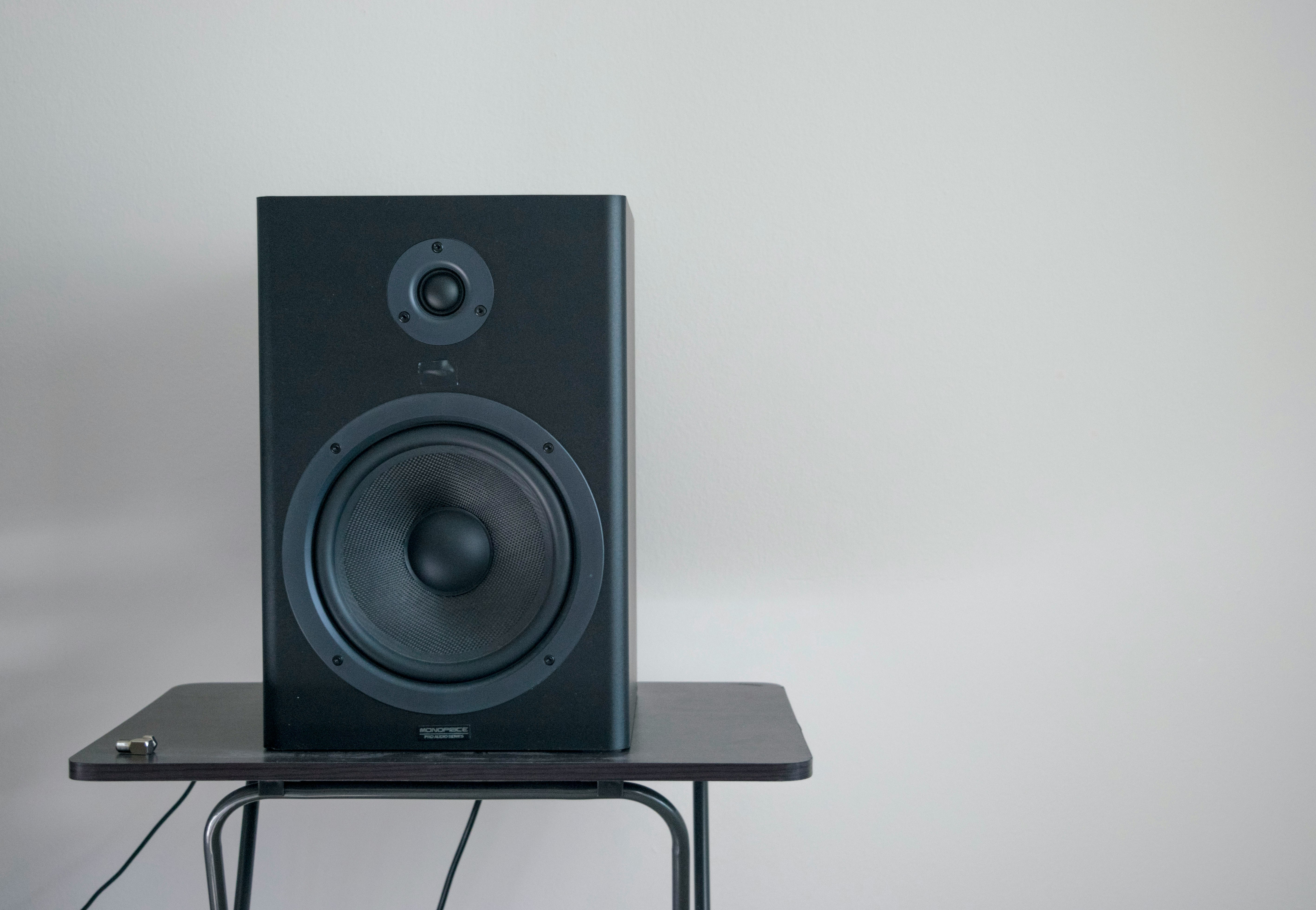 speaker placed on a table - Best Speakers for Music Production
