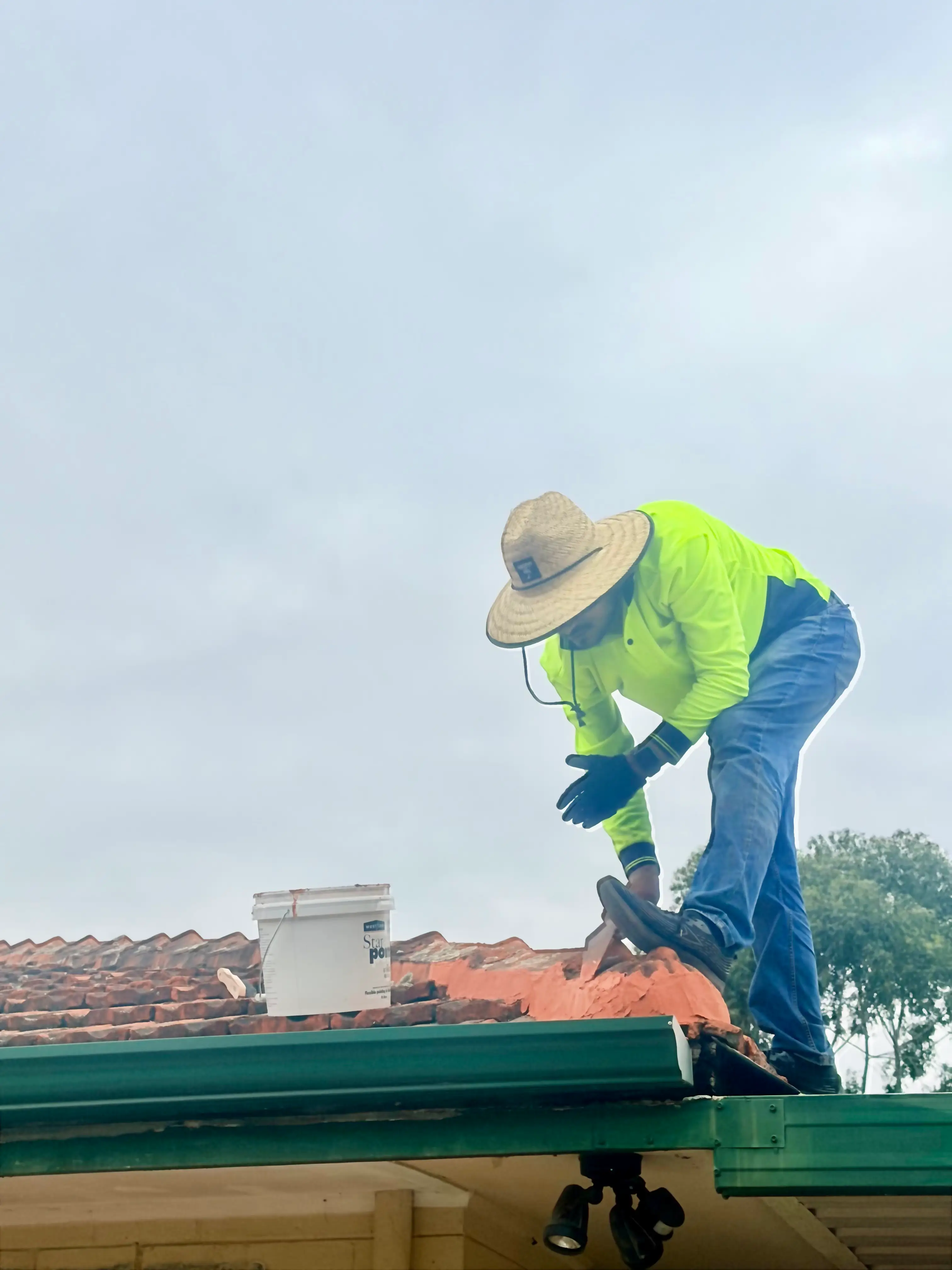 Ridge capping repointing completed on a tiled roof in Rossmoyne WA