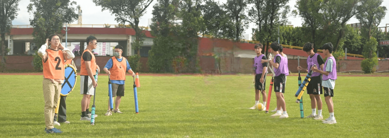 two people in a workspace working on their laptops 