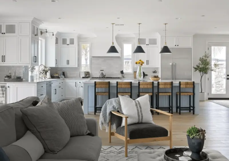 Wide perspective of the entire kitchen seen from the living room in the Dana Point Remodel. Photo by Todd Huge.