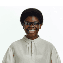 A woman of black tone skin with glasses smiling