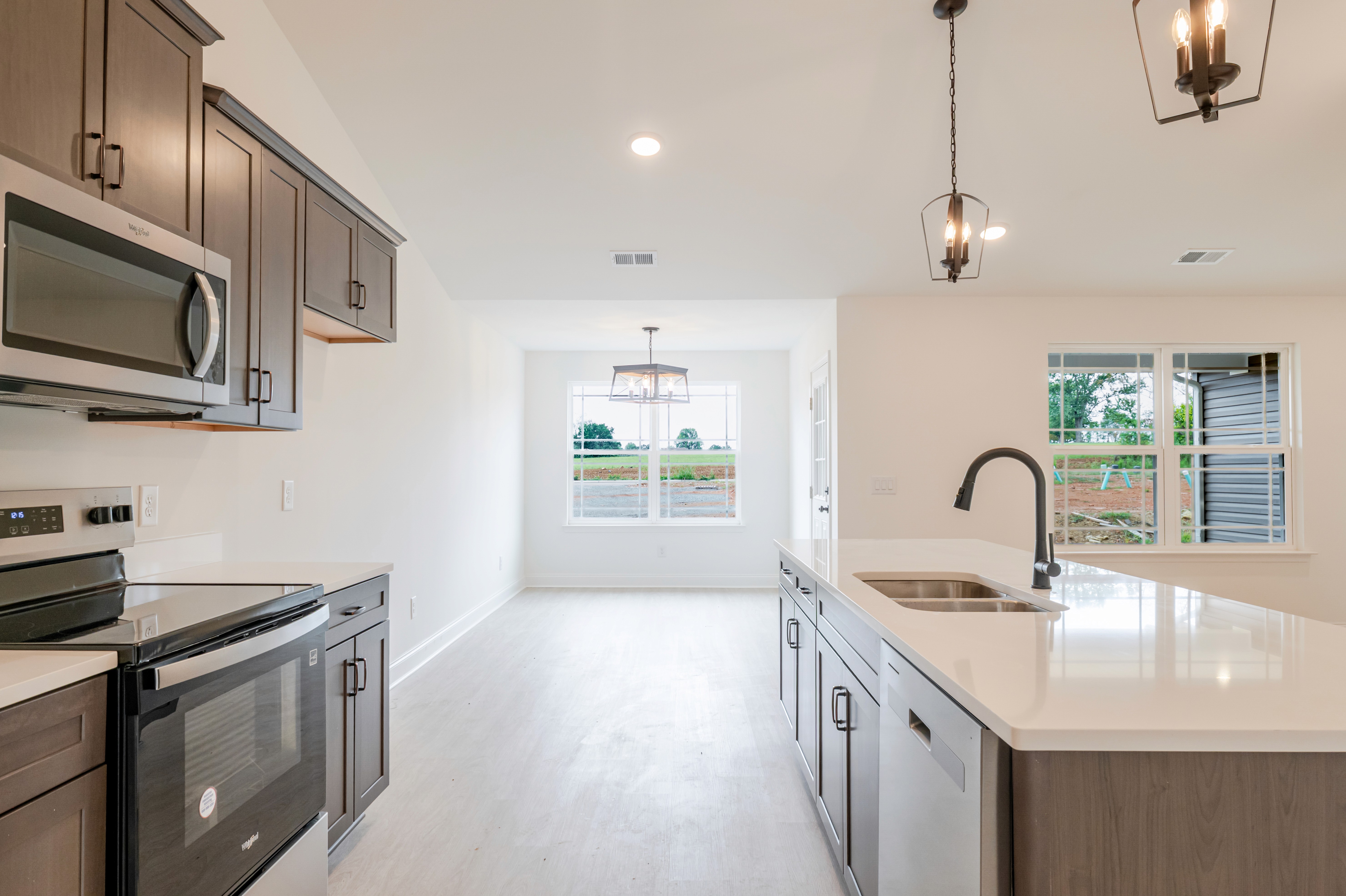 Woman near microphone in recording studio