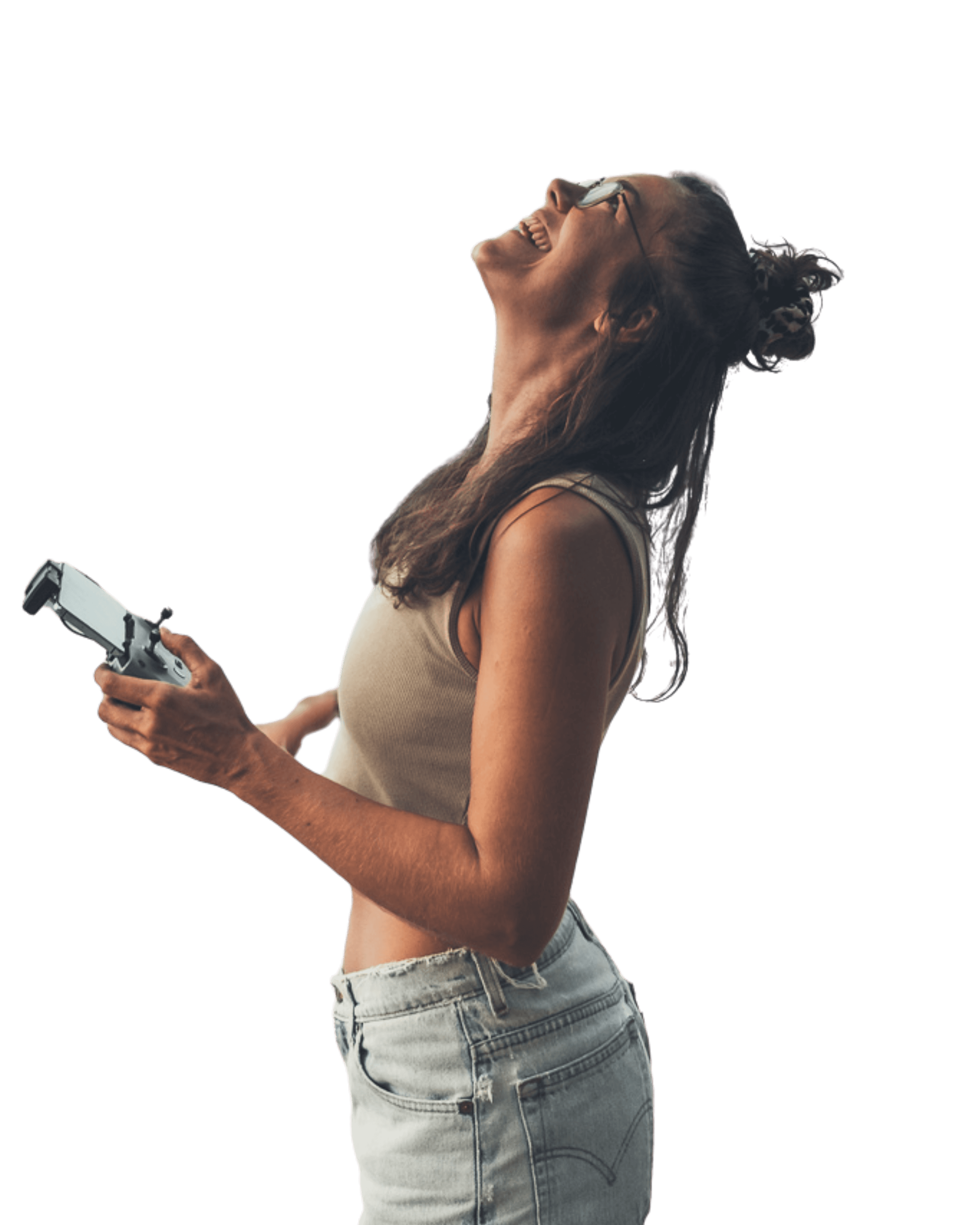 Eva holding a drone controller and laughing.