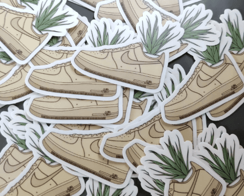 A person stands in a sandstone cave.