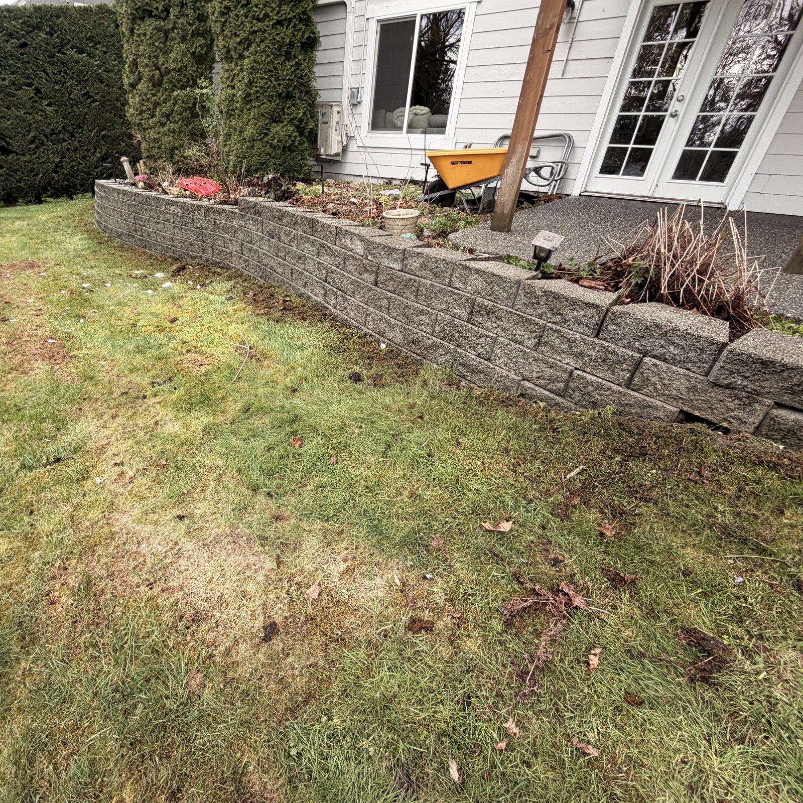 After: retaining wall pressure washing by Peterson Property Services in Snohomish, WA