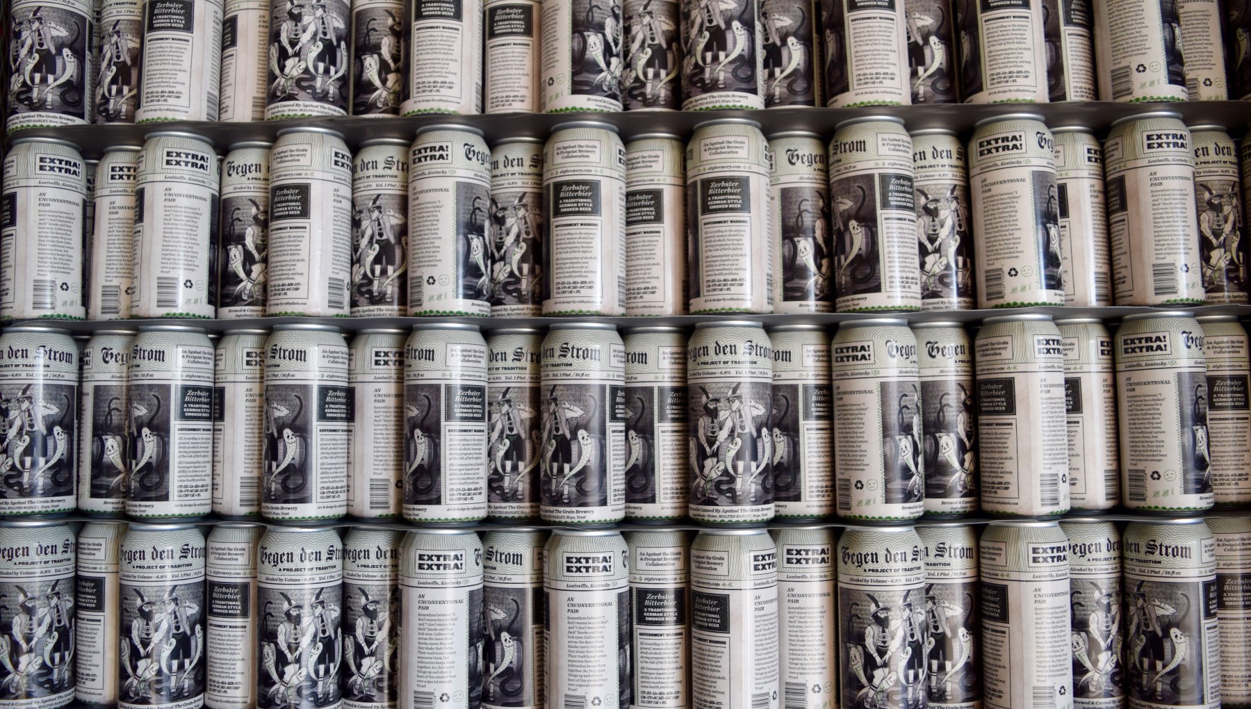 Image of the Against the Grain cans stacked on palettes