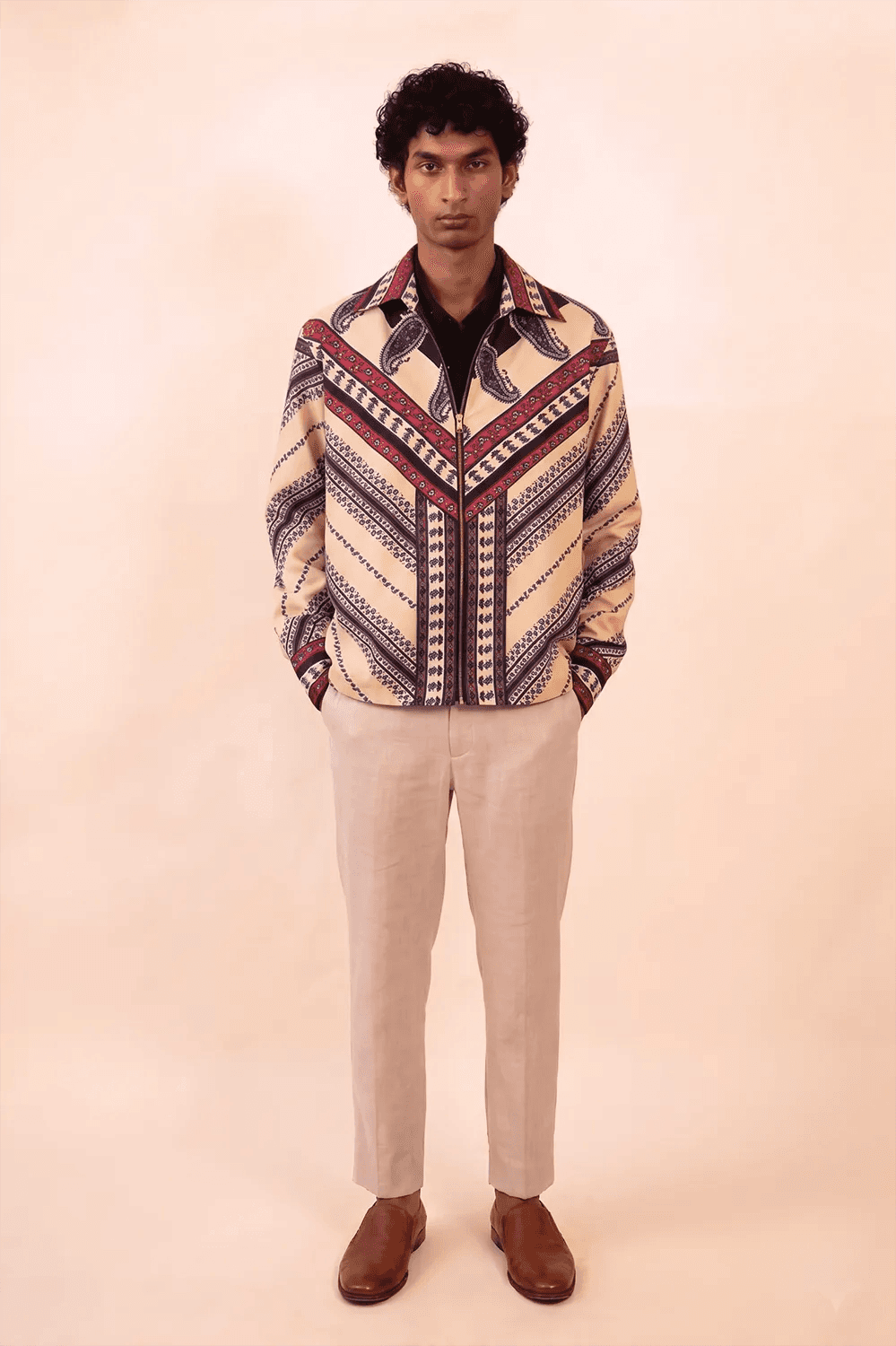 Aksa Bomber IV is our one-of-a-kind printed silk bomber jacket, handcrafted by skilled artisans in-house using a one-of-a-kind vintage silk saree.