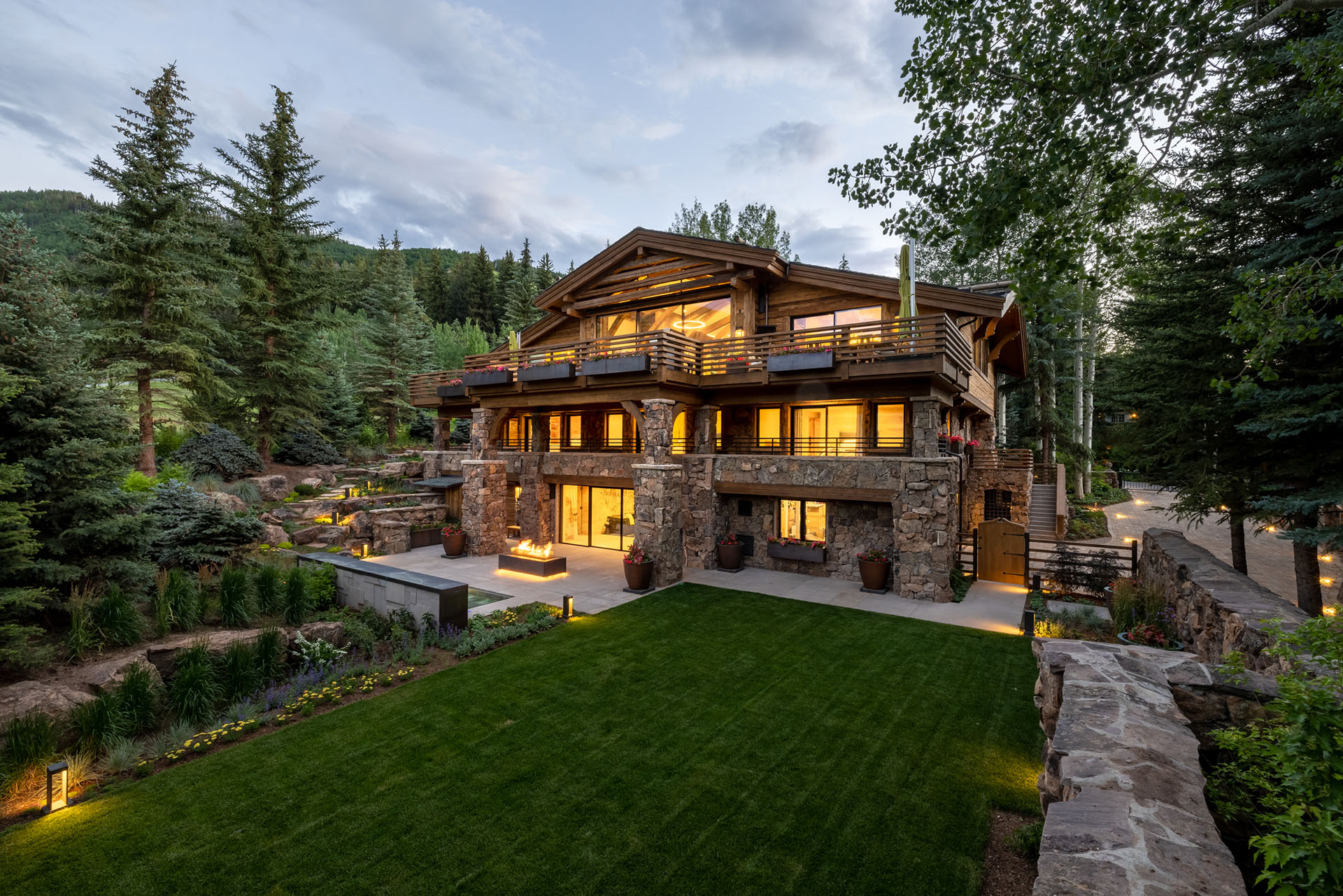 A cosy house surrounded by a clean simple garden.
