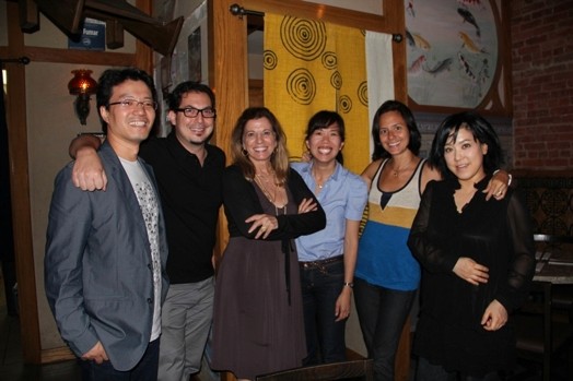 a group photo of two men and four women