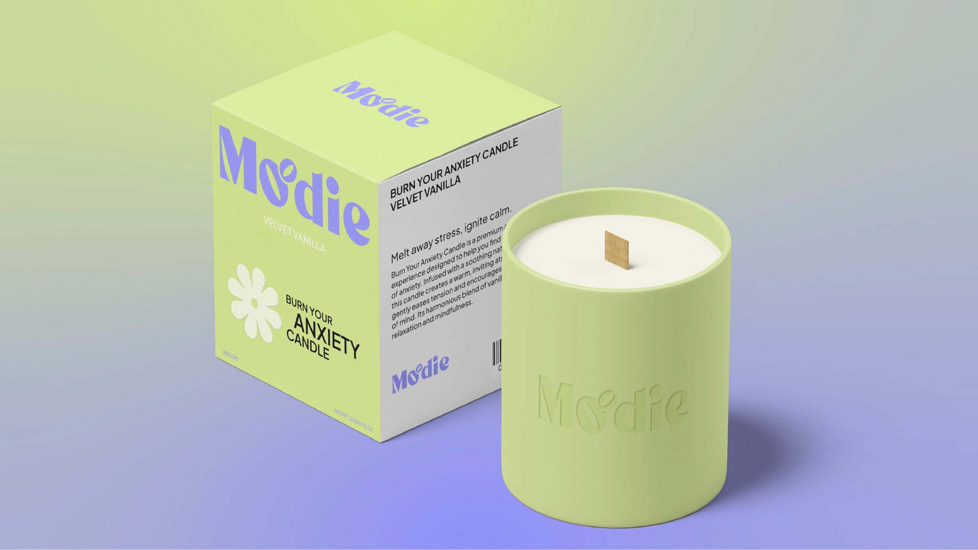 A light green cylindrical candle in a pale green container sits beside its box. The box is labeled “Moodie” and “BURN YOUR ANXIETY CANDLE,” with a white flower logo and “VELVET VANILLA” text. The candle has a white top and a small wooden wick. The background is a gradient of light green and purple.