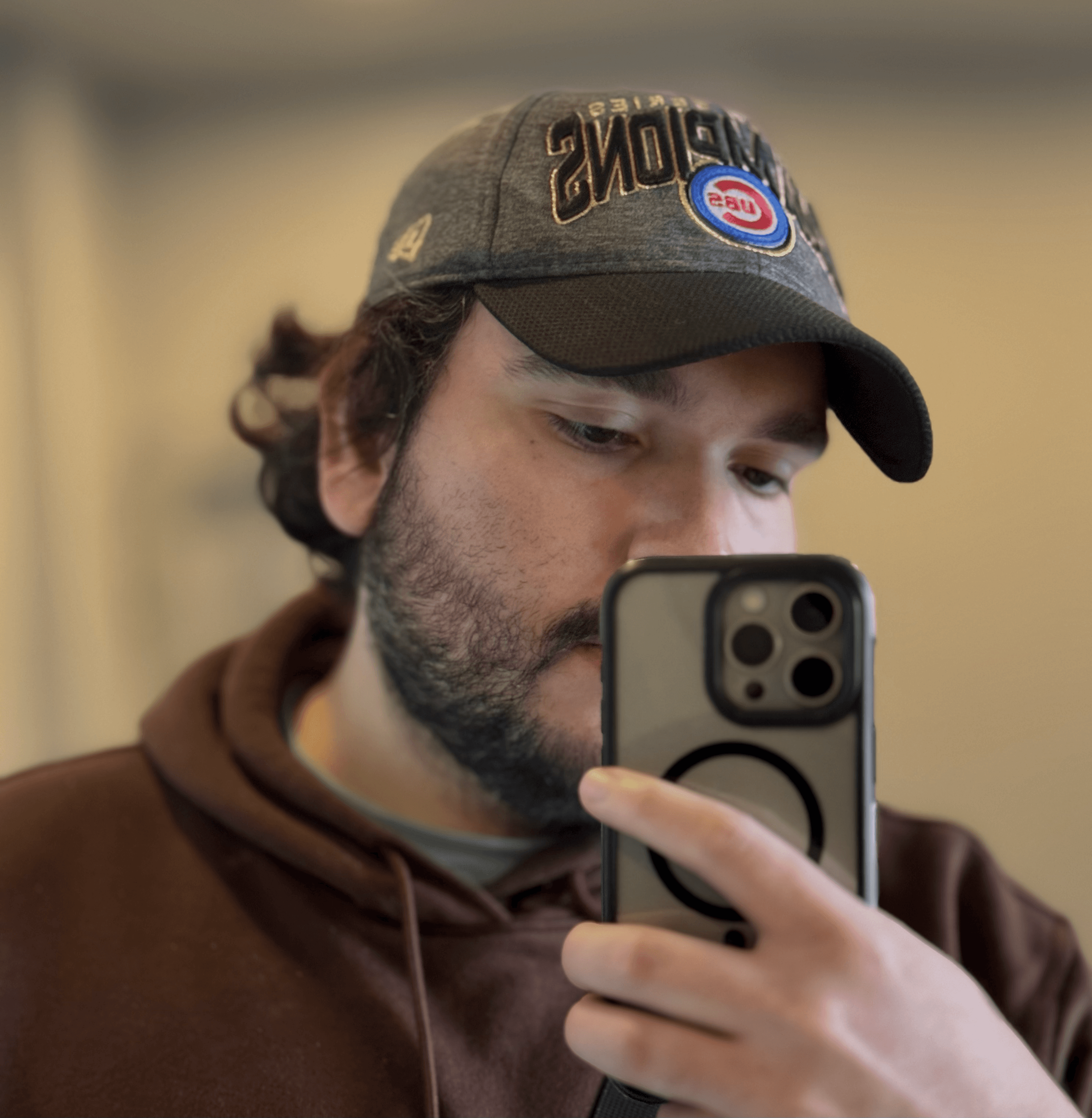 a blurry photo of a person standing in front of a wall