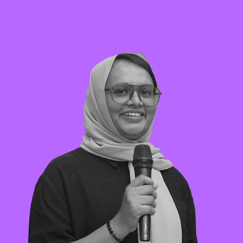 grayscale photo of woman wearing necklace and top