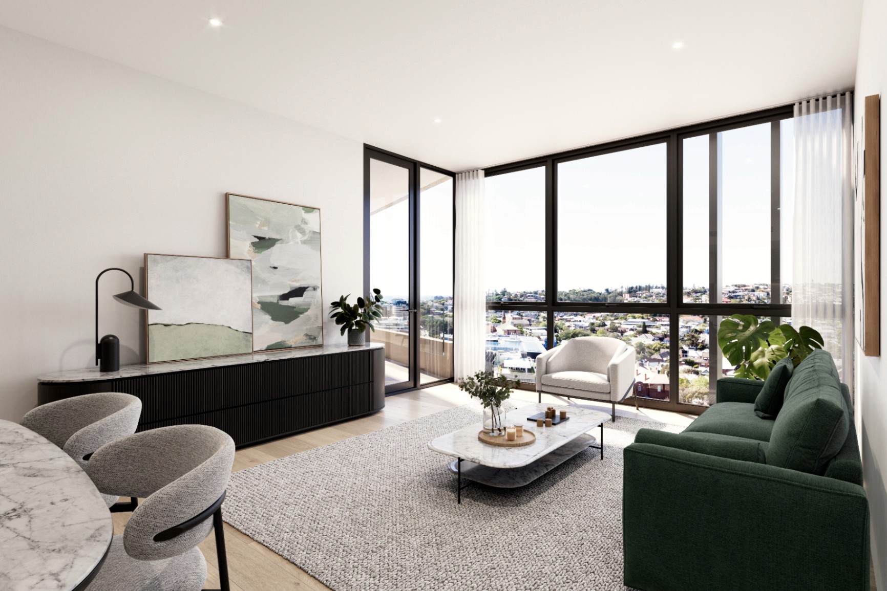 Bright open-plan living and dining area inside a The Avenues apartment, featuring floor-to-ceiling windows, balcony access, and modern interior finishes.